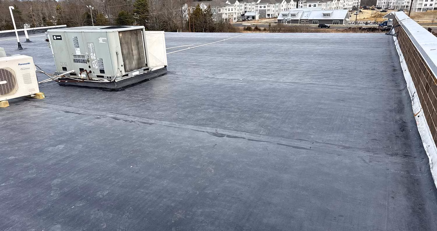 Byrum Builders the importance of regular commercial roof maintenance.